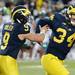 Michigan kicker Brendan Gibbons celebrates making the winning field goal as teammate wide receiver Drew Dileo stands by in the last seconds of the game against Michigan State at Michigan Stadium on Saturday. Melanie Maxwell I AnnArbor.com
